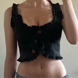 black ruffled waist coat